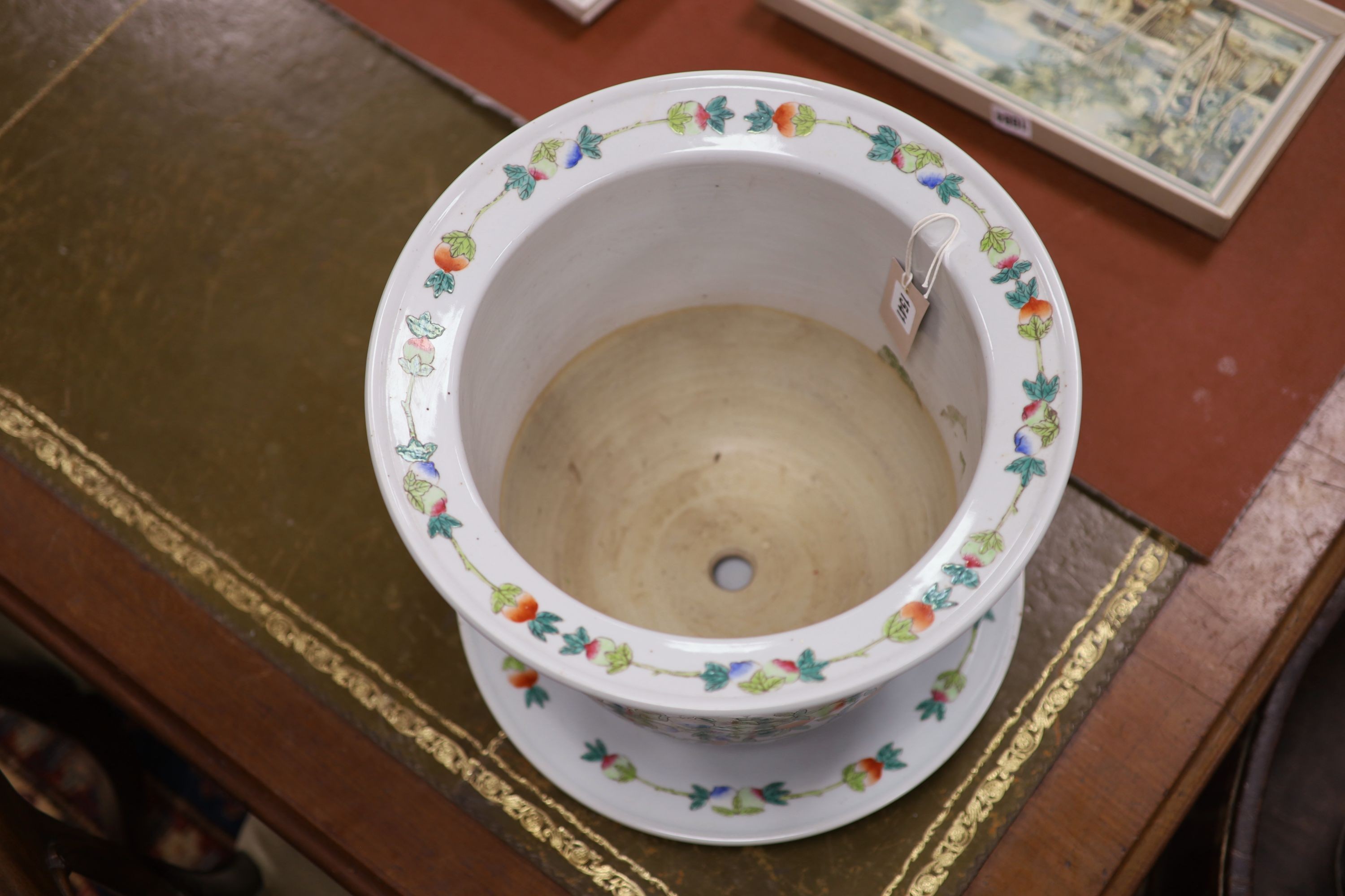 A 20th century Chinese porcelain jardiniere and dish, diameter 36 cms.